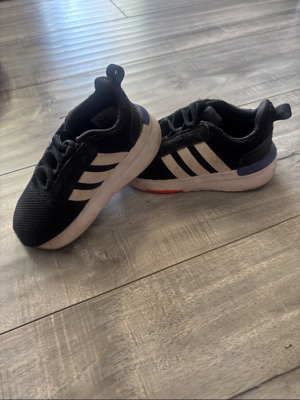 adidas Kids Black Sneakers with White Stripes and Blue Heel Accent